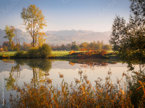 Beautiful autumn morning at the Kreutsee in Kiefersfelden photo