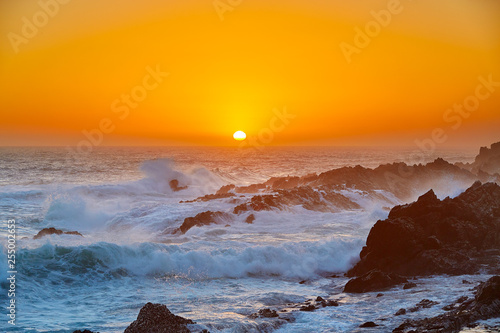 Waves at beautiful sunset