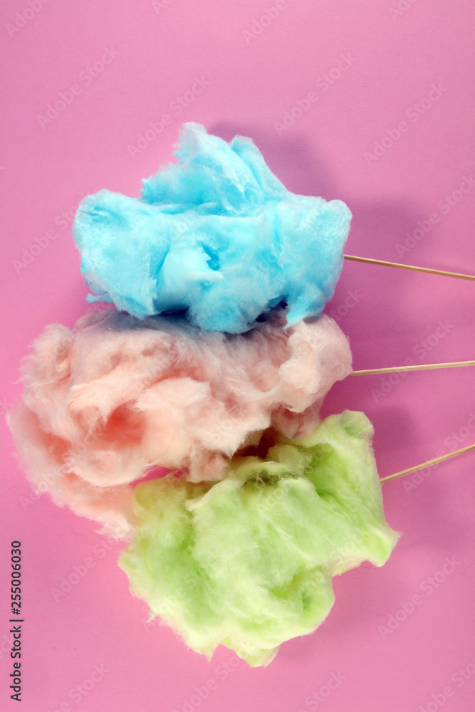 Obraz premium colorful cotton candy floss. sweet party food in pink and green
