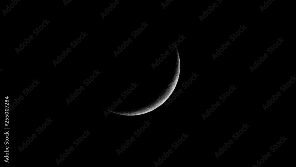 First quarter moon, with craters and surface details visible. First quarter moon, with craters and surface details visible.