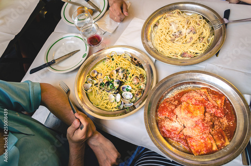 Photography people eating in italian restaurant