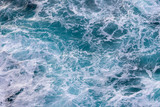 Background of the sea. Waves with foam top view
