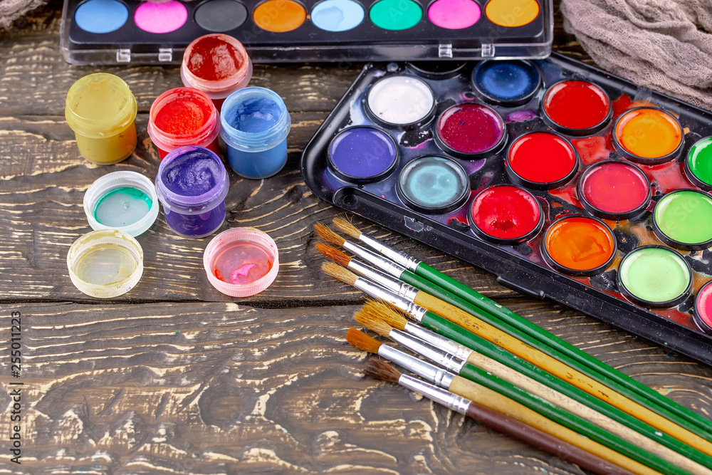 Paint brushes and paints for drawing. Paint brushes and paints for drawing.