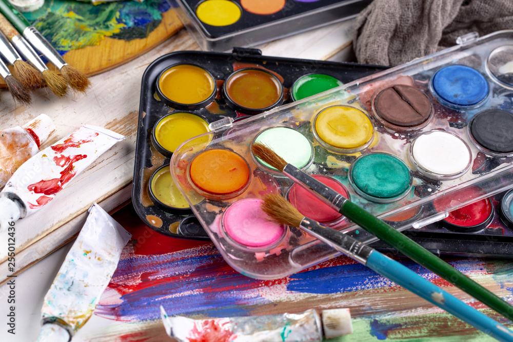 Paint brushes and paints for drawing. Paint brushes and paints for drawing.