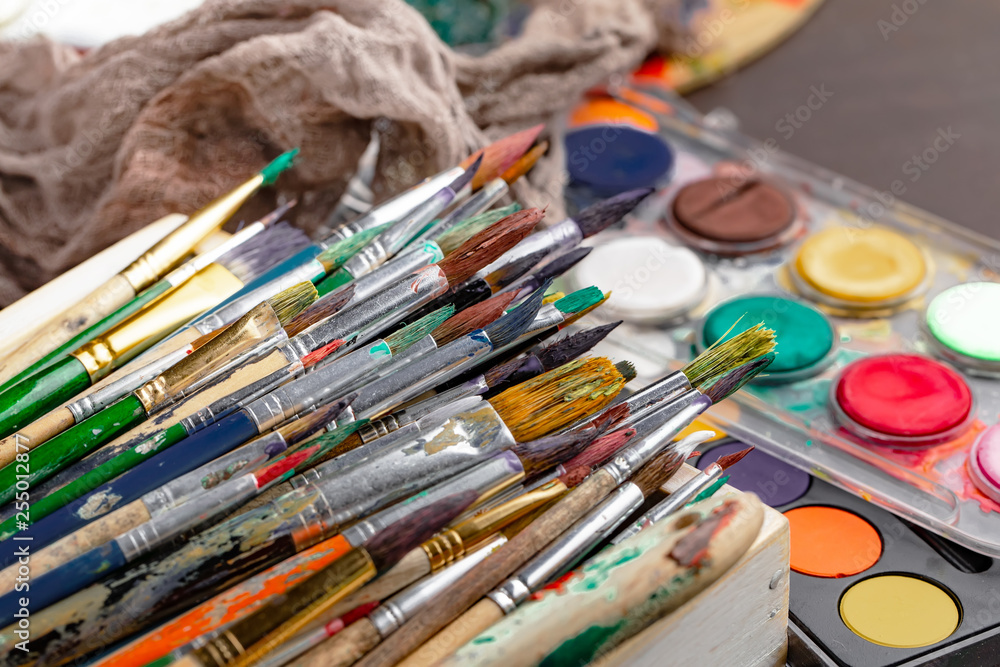 Paint brushes and paints for drawing. Paint brushes and paints for drawing.