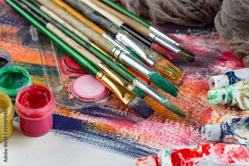 Paint brushes and paints for drawing. Paint brushes and paints for drawing.