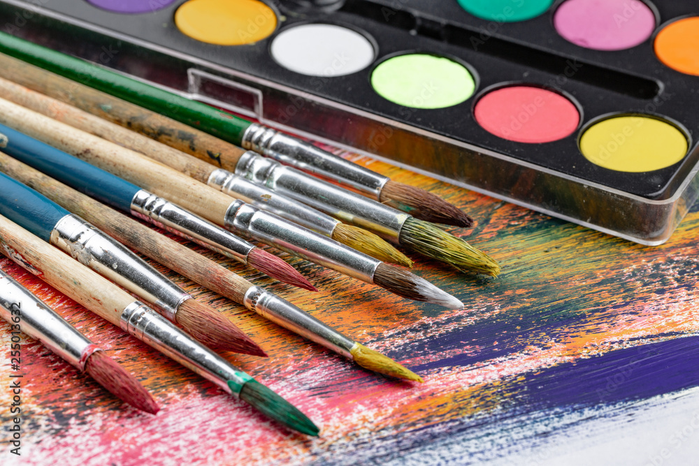 Fototapeta premium Paint brushes and paints for drawing.