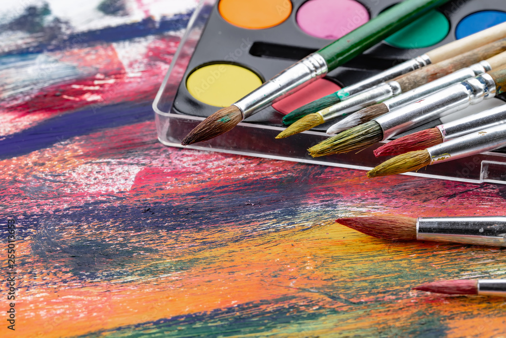 Fototapeta premium Paint brushes and paints for drawing.