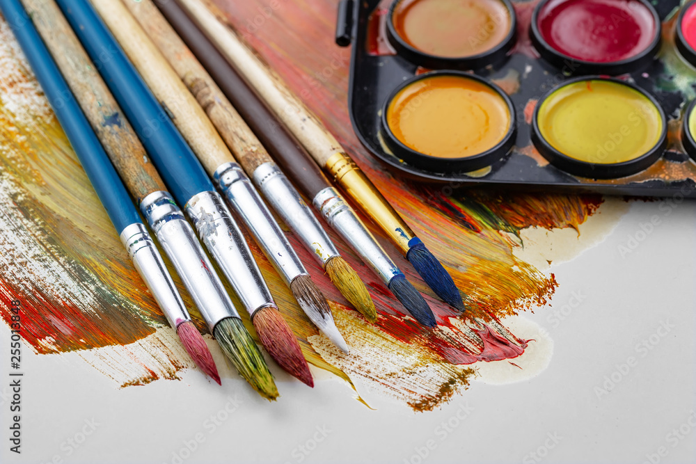 Fototapeta premium Paint brushes and paints for drawing.