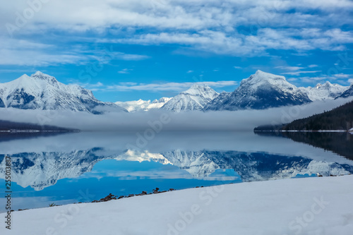 landscape of winter lake in fog  Lake McDonald  Glacier National Park  Montana