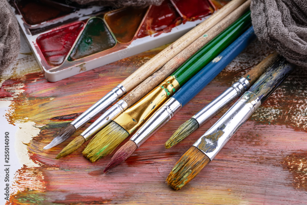 Fototapeta premium Paint brushes and paints for drawing.