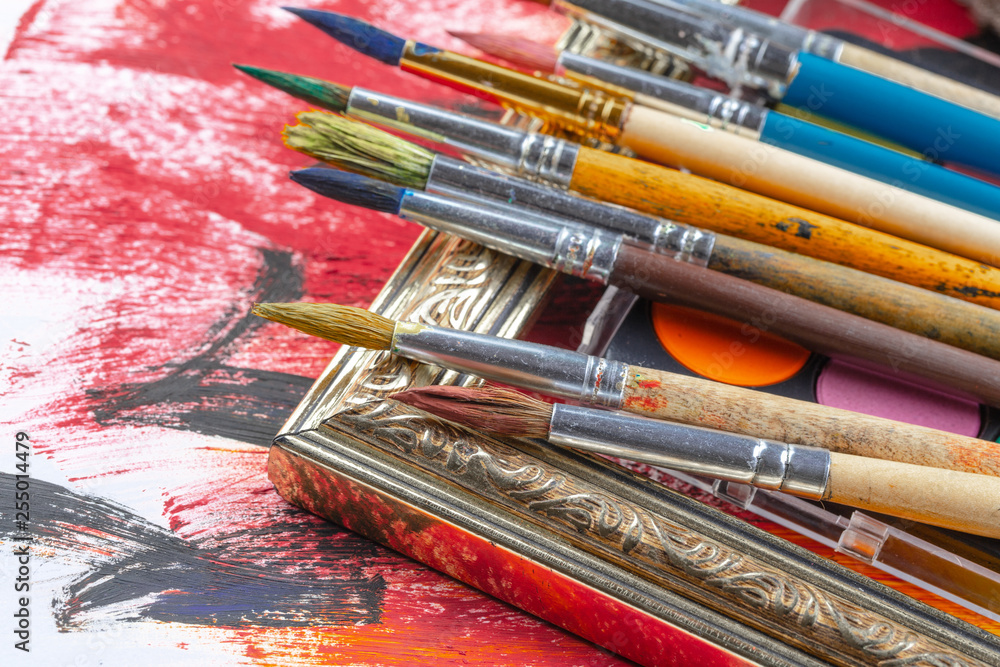 Fototapeta premium Paint brushes and paints for drawing.
