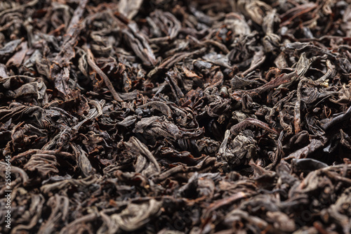 Dried tea leaves. Large leaf black tea.