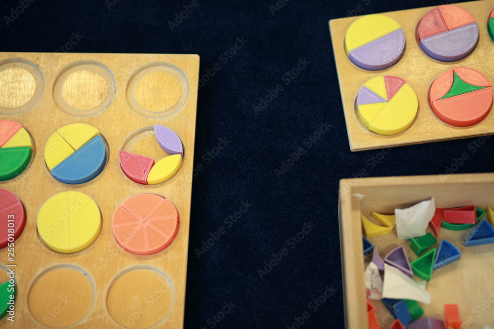 Montessori material fraction circles in the classroom Montessori material fraction circles in the classroom