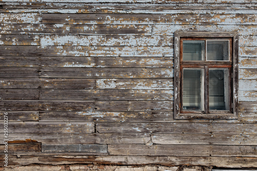 Blank ad space on a wooden old wall in the street outside © dissx