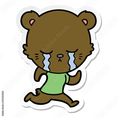 sticker of a crying cartoon bear running