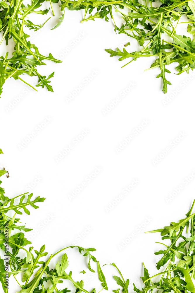 fitness food cooking with green salad mix on white background top view copyspace