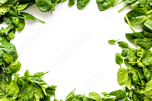 organic food pattern with green salads mix white background top view space for text