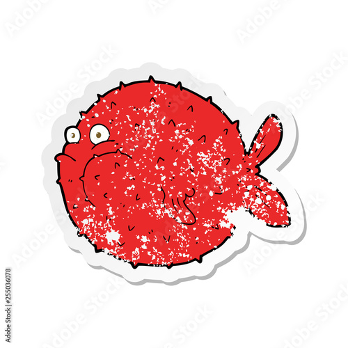 retro distressed sticker of a cartoon puffer fish