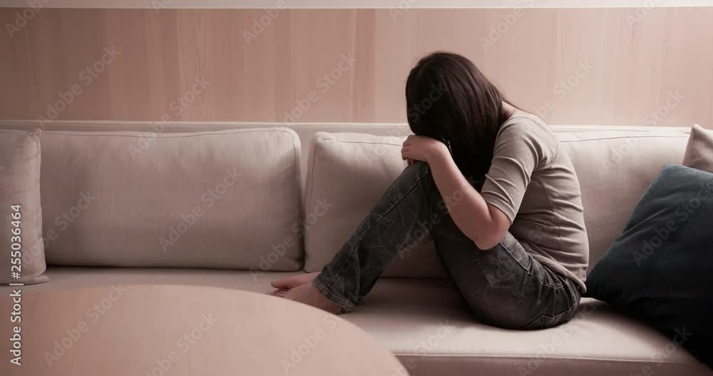 woman feel depressed on sofa woman feel depressed on sofa