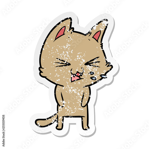 distressed sticker of a cartoon cat hissing