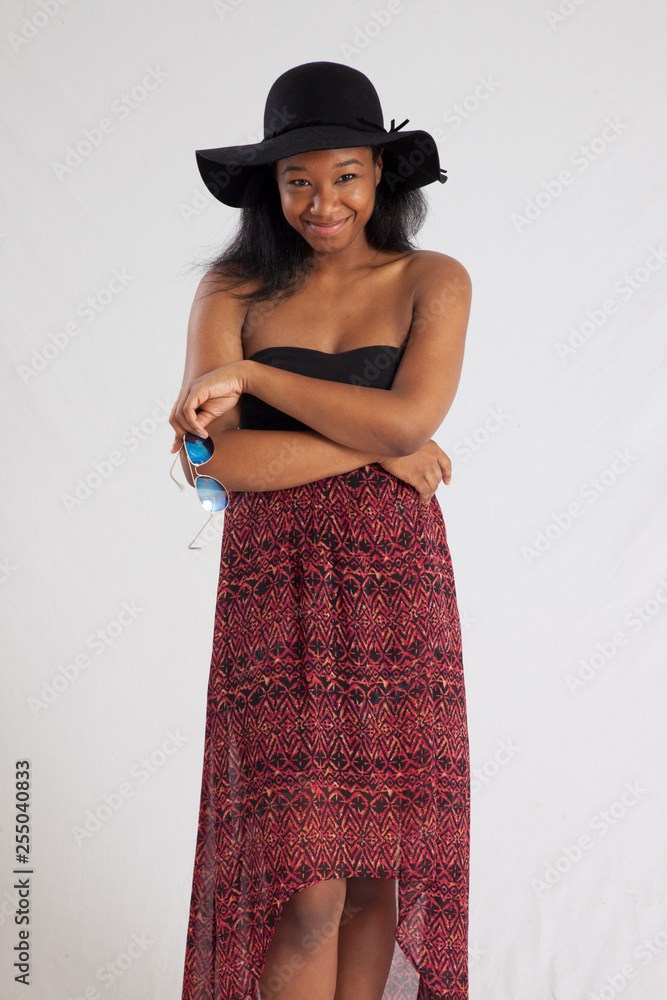 Pretty Black woman with sunglasses and a hat Pretty Black woman with sunglasses and a hat