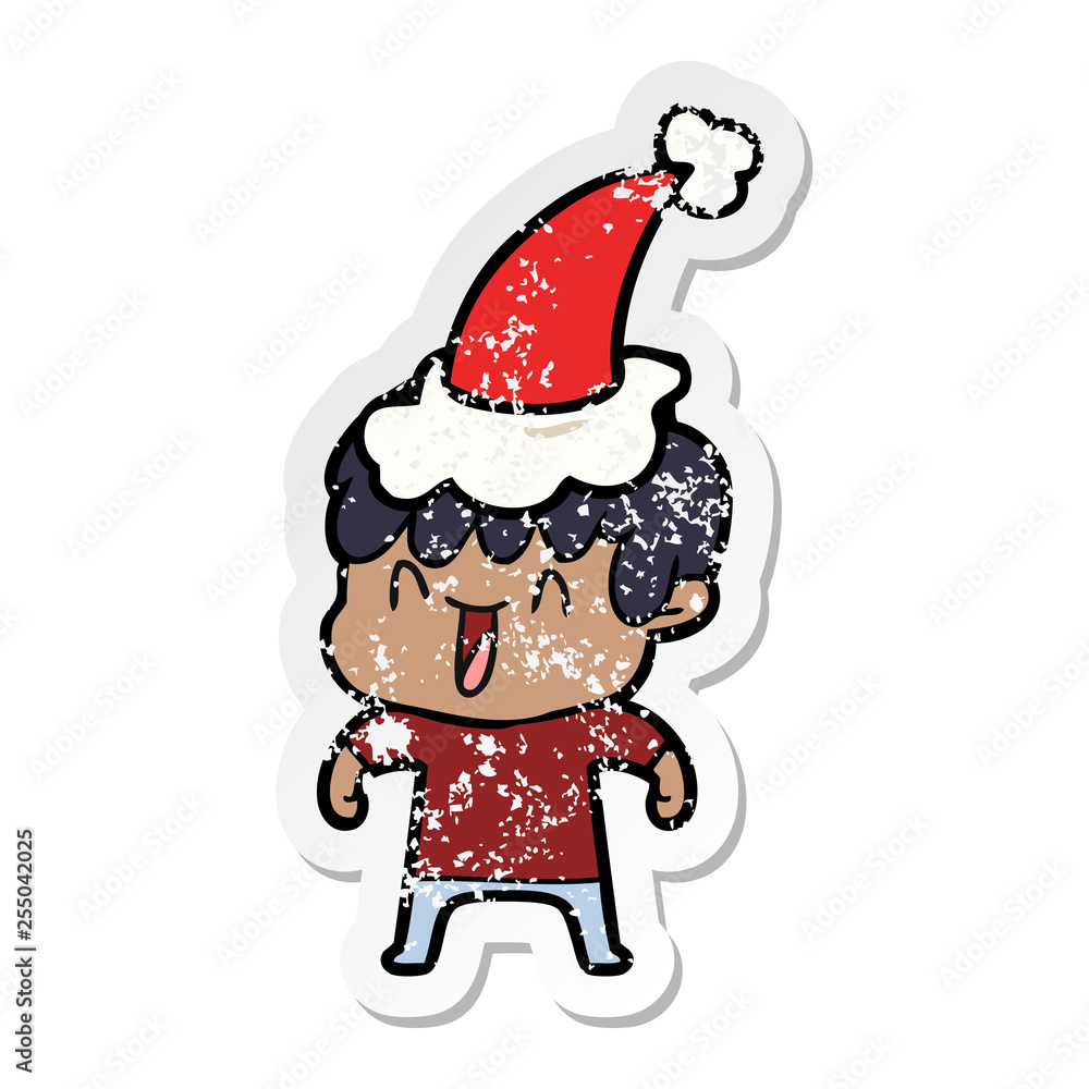 Obraz premium distressed sticker cartoon of a laughing boy wearing santa hat