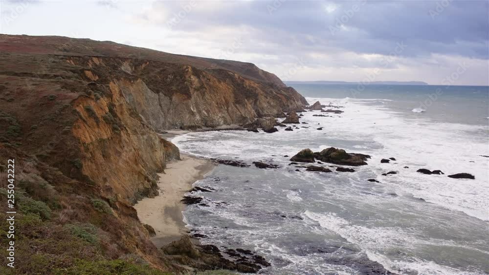 Cliffs on the California coastline in early evening shot at Point Reyes National Seashore. Cliffs on the California coastline in early evening shot at Point Reyes National Seashore.