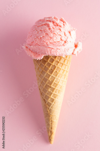 Scoop of Strawberry Ice Cream in a Waffle Cone