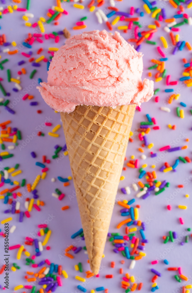 Scoop of Strawberry Ice Cream in a Waffle Cone Scoop of Strawberry Ice Cream in a Waffle Cone