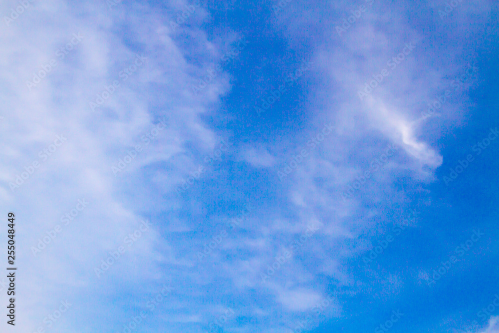 blue sky background with tiny clouds blue sky background with tiny clouds