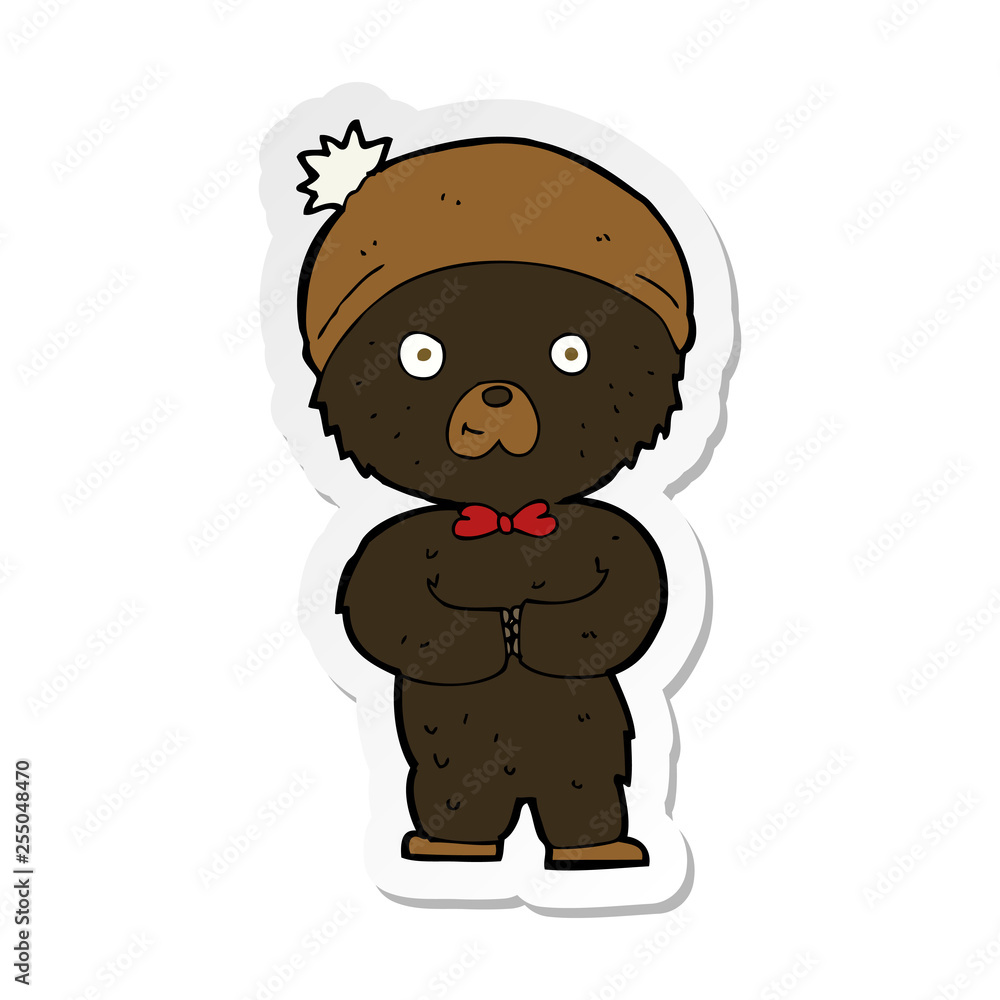 sticker of a cartoon little black bear sticker of a cartoon little black bear
