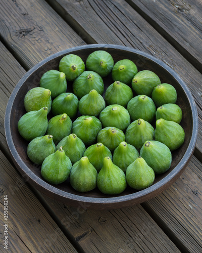 Bowl of fresh green figs photo