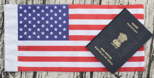Closeup of Indian passport on USA or america's flag as a background