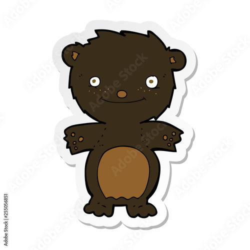 sticker of a cartoon happy little black bear