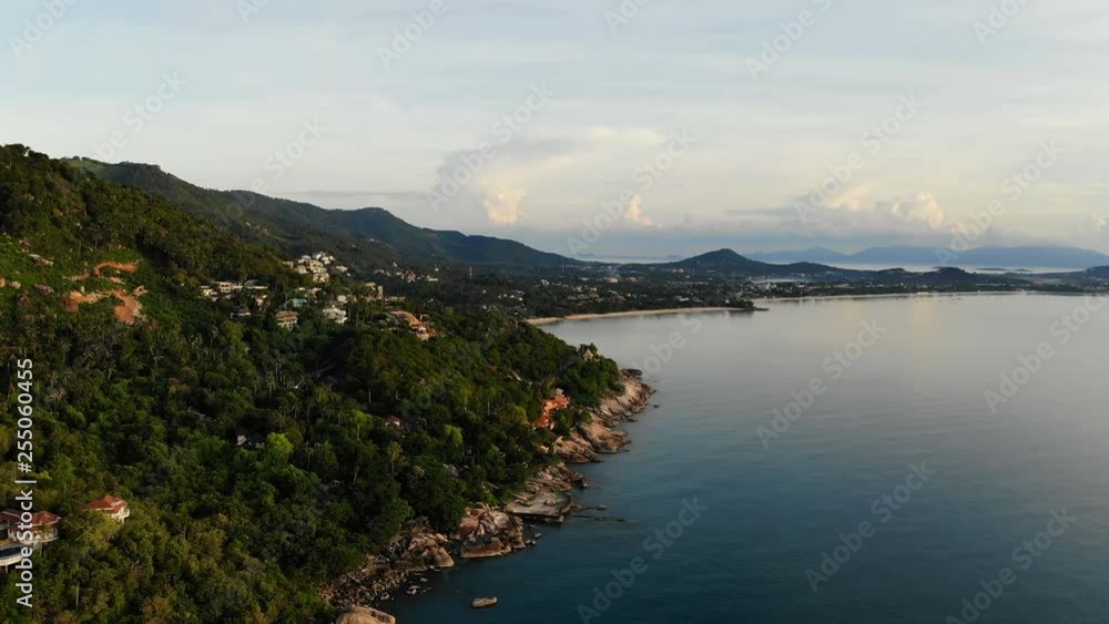 Aerial view of tropical sea and beach on white cloud and blue sky Aerial view of tropical sea and beach on white cloud and blue sky