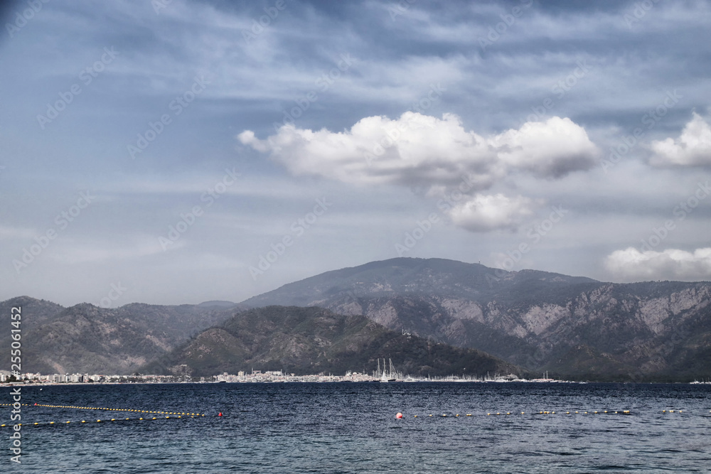 Landscape with sea and mountain in a summer day