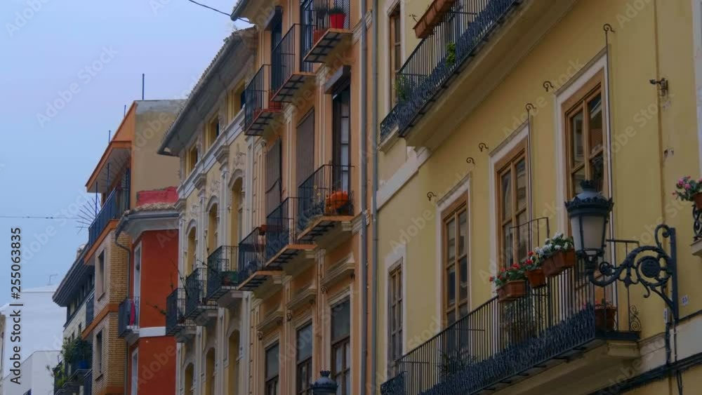 Beautiful picturesque houses in the city with individual classic national design, typical of Spain. Shot in motion Beautiful picturesque houses in the city with individual classic national design, typical of Spain. Shot in motion