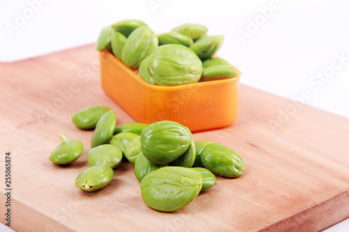 Parkia speciosa seeds or bitter bean on white background