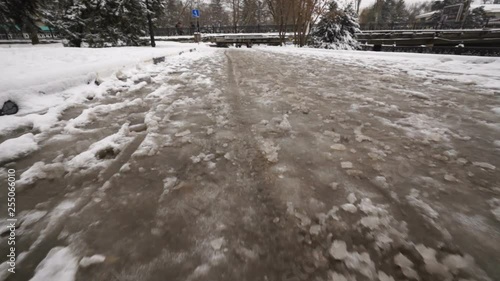 Wallpaper Mural Walking on sidewalk with melted and frozen snow steadicam gimbal movement. Torontodigital.ca
