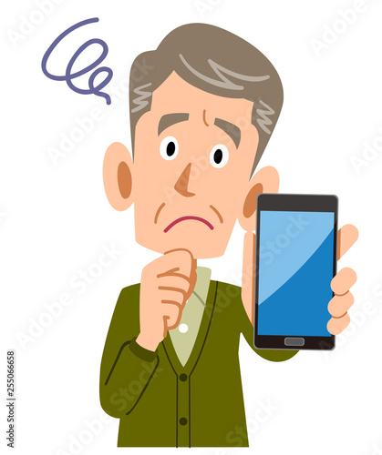 スマートフォンを手に持ち困るシニアの男性