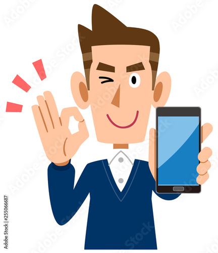 スマートフォンを手に持ちOKのサインを示す男性