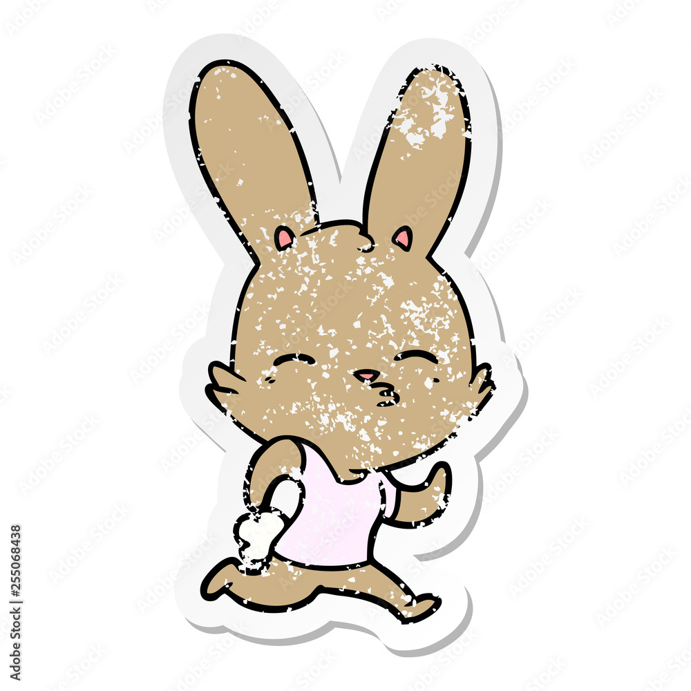 Obraz premium distressed sticker of a cartoon running rabbit