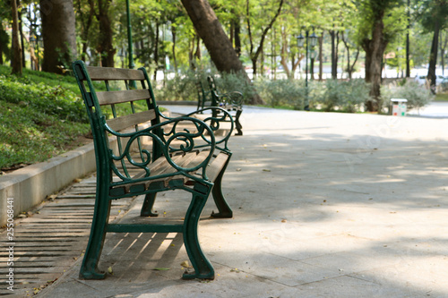 the Wooden Long bench in the park.