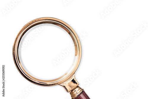 Gold magnifier on white background