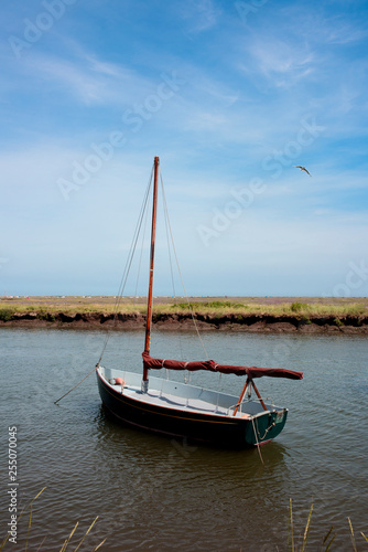sailboat anchoring on the canal
