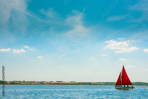 sail boat on calm water © MbyM