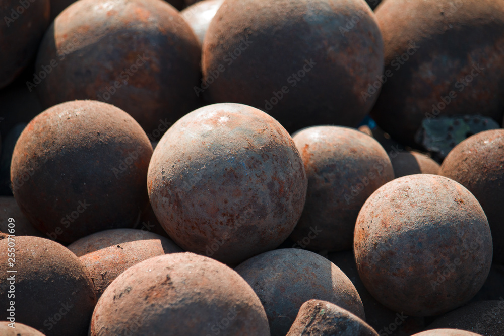 Stack of old colonial rusty cannon balls Stack of old colonial rusty cannon balls