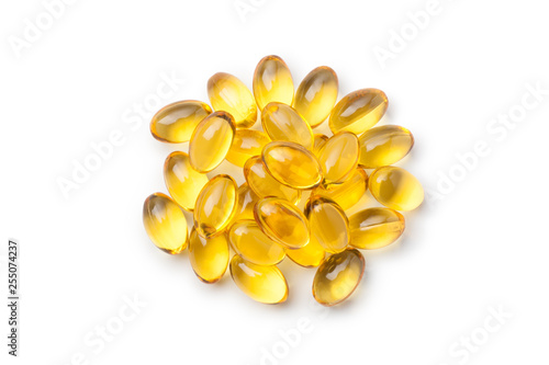 Pile of fish oil capsules isolated on white background. Top view.