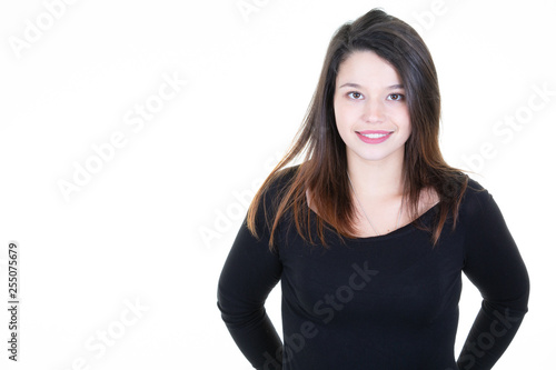 Portrait of happy smiling young beautiful woman isolated over white background. Looking at camera with free copy space for text